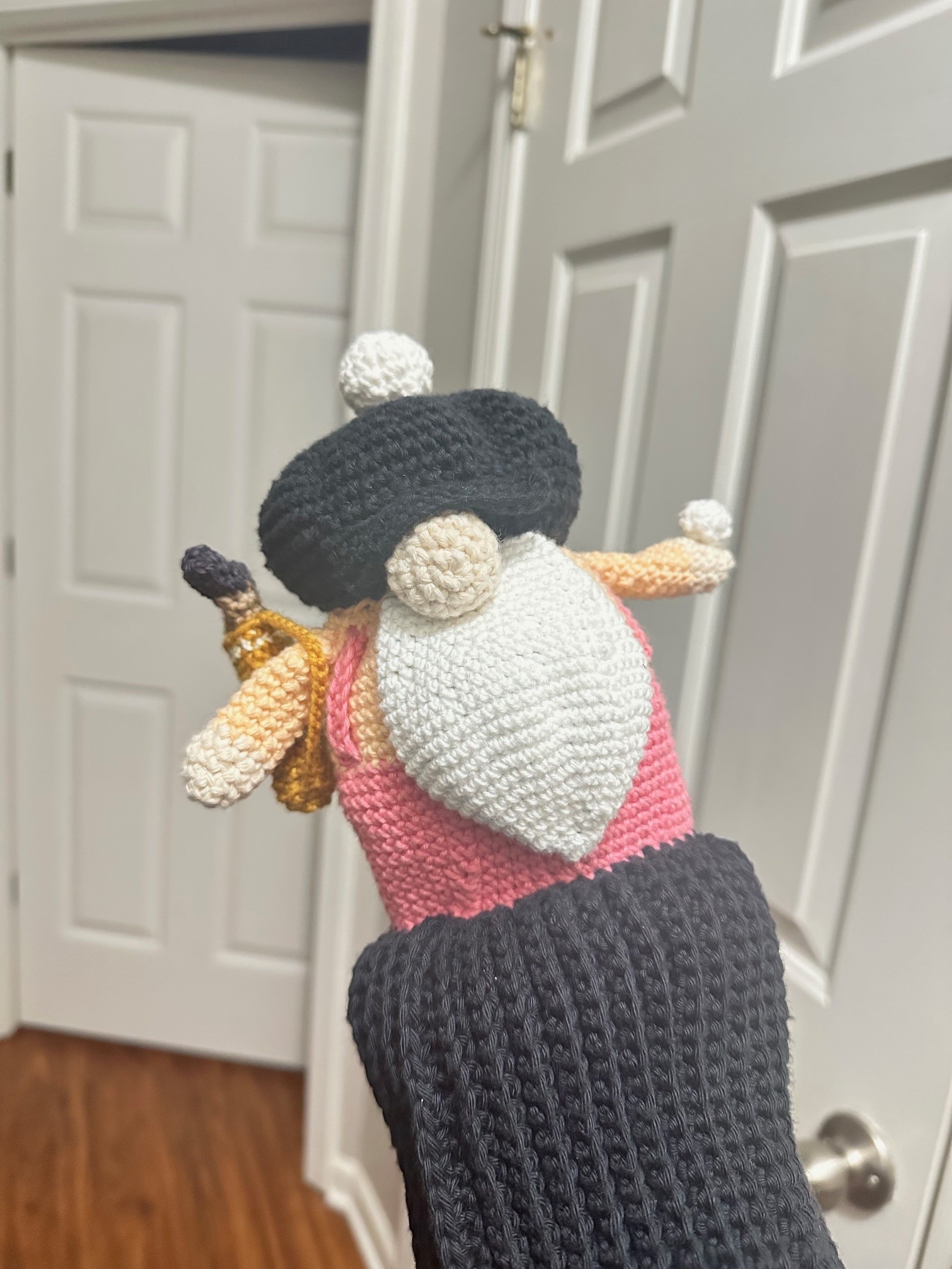 A crocheted gnome