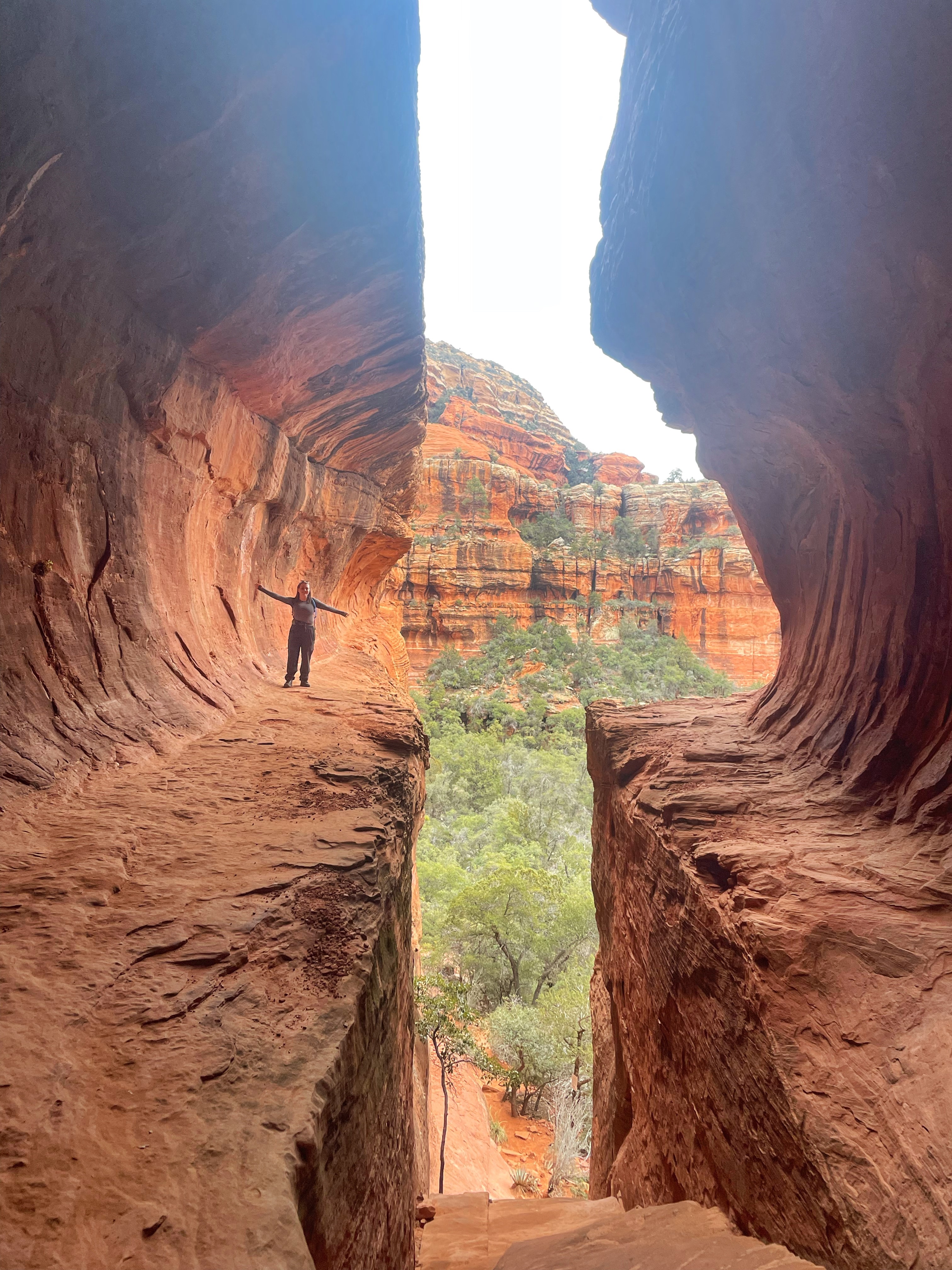 Hannah hiking in a cave